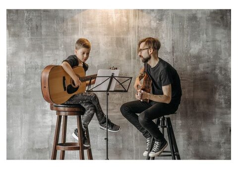 Guitar Lessons for Beginners — First Class Free